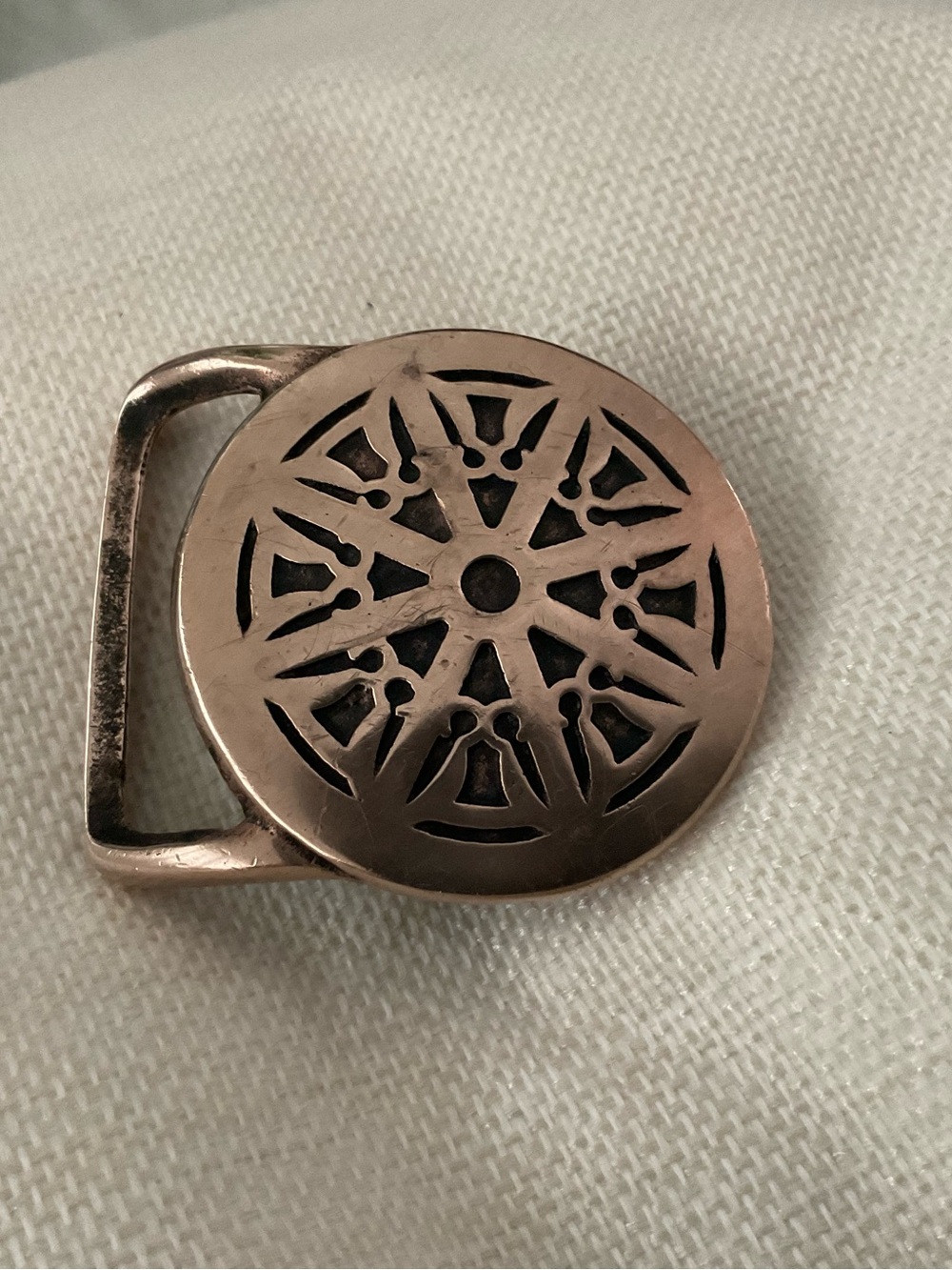 RARE BRASS ‘WHEEL OF LAW’ BELT BUCKLE